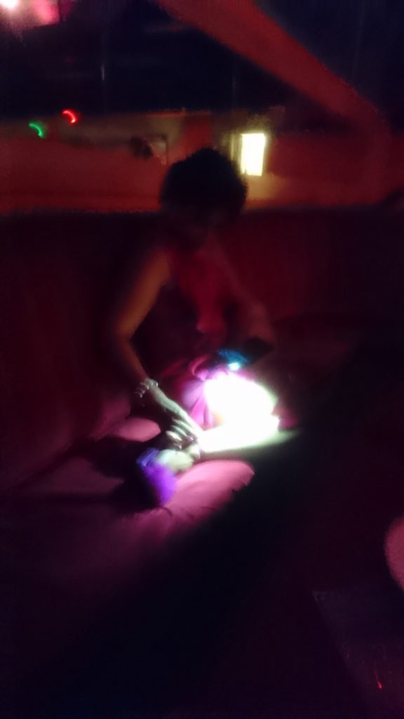 Foot Loose – A milonguera adjusts her shoe by the light of her mobile phone at Negracha Tango Club, Holborn, London | August 2017 | Sony Xperia Z5